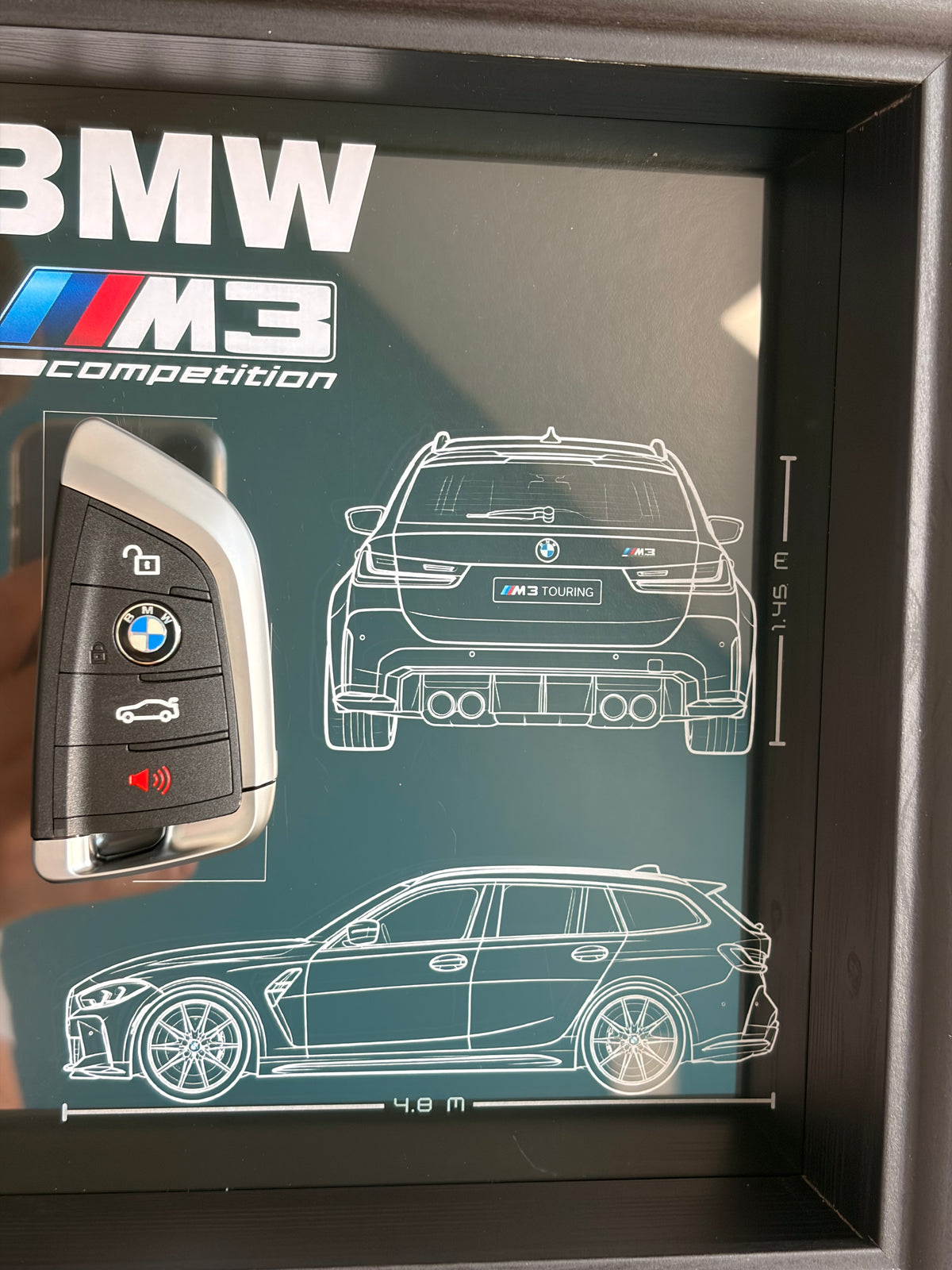 Cadre avec clé décorative de BMW M3 G81 Touring compétition