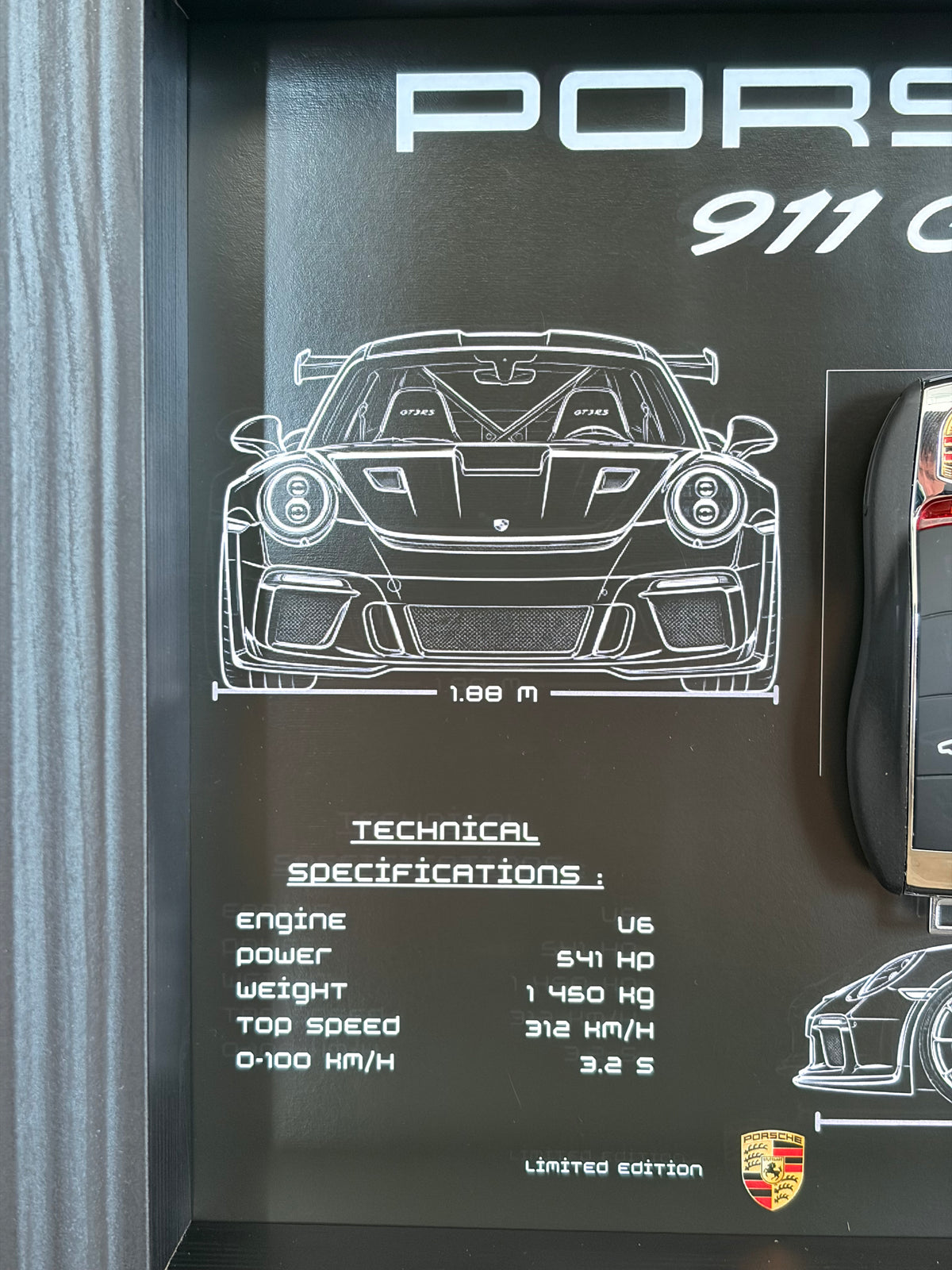 Rahmen mit dekorativem Schlüssel des Porsche 911 GT3 RS